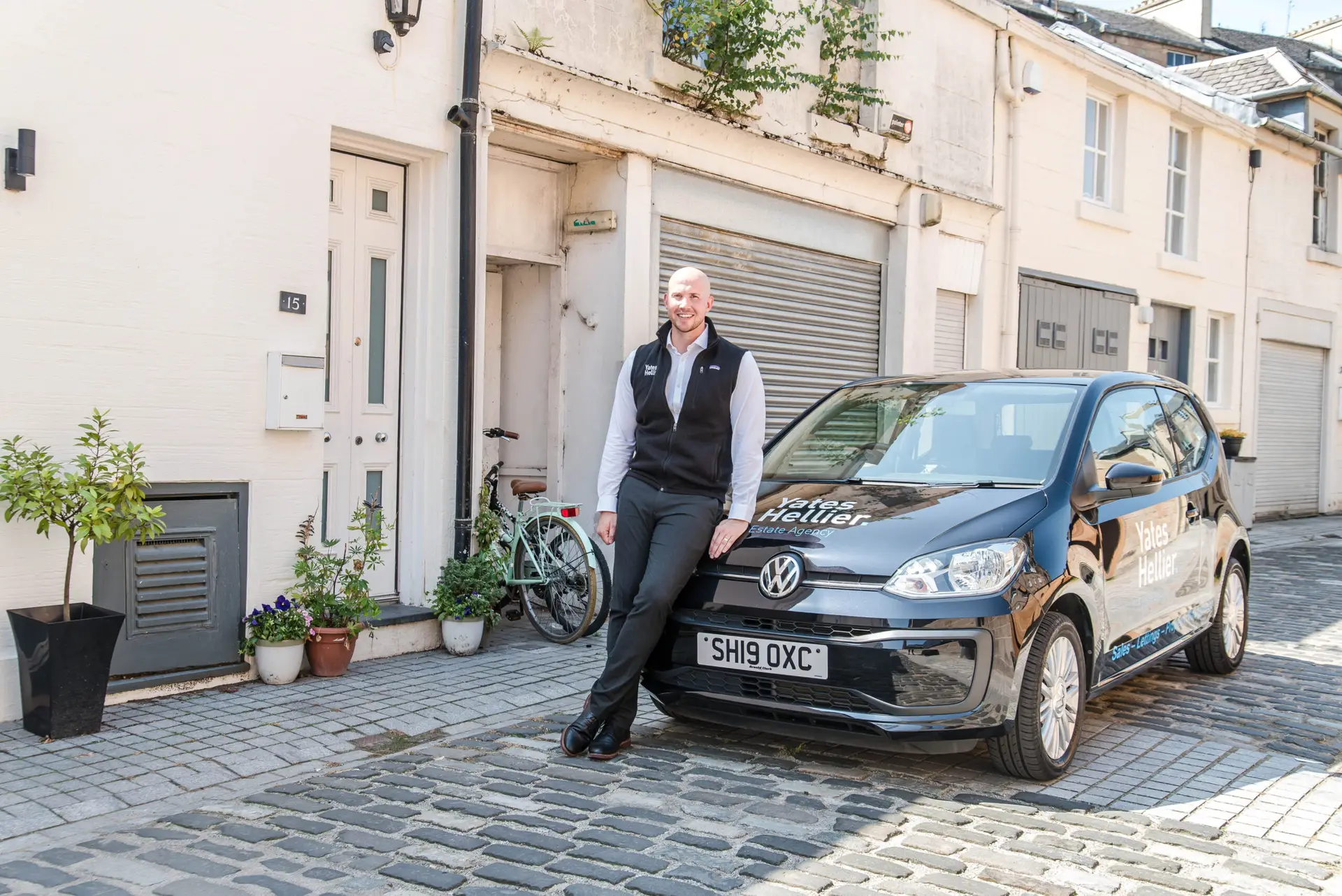 Yates Hellier letting agent conducting an in-person property viewing in a Glasgow rental flat